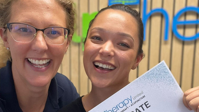 Zolene Mayberry and Hannah Poulton with Zolene's scar therapy certificate of completion at HLP Therapy in Leicester