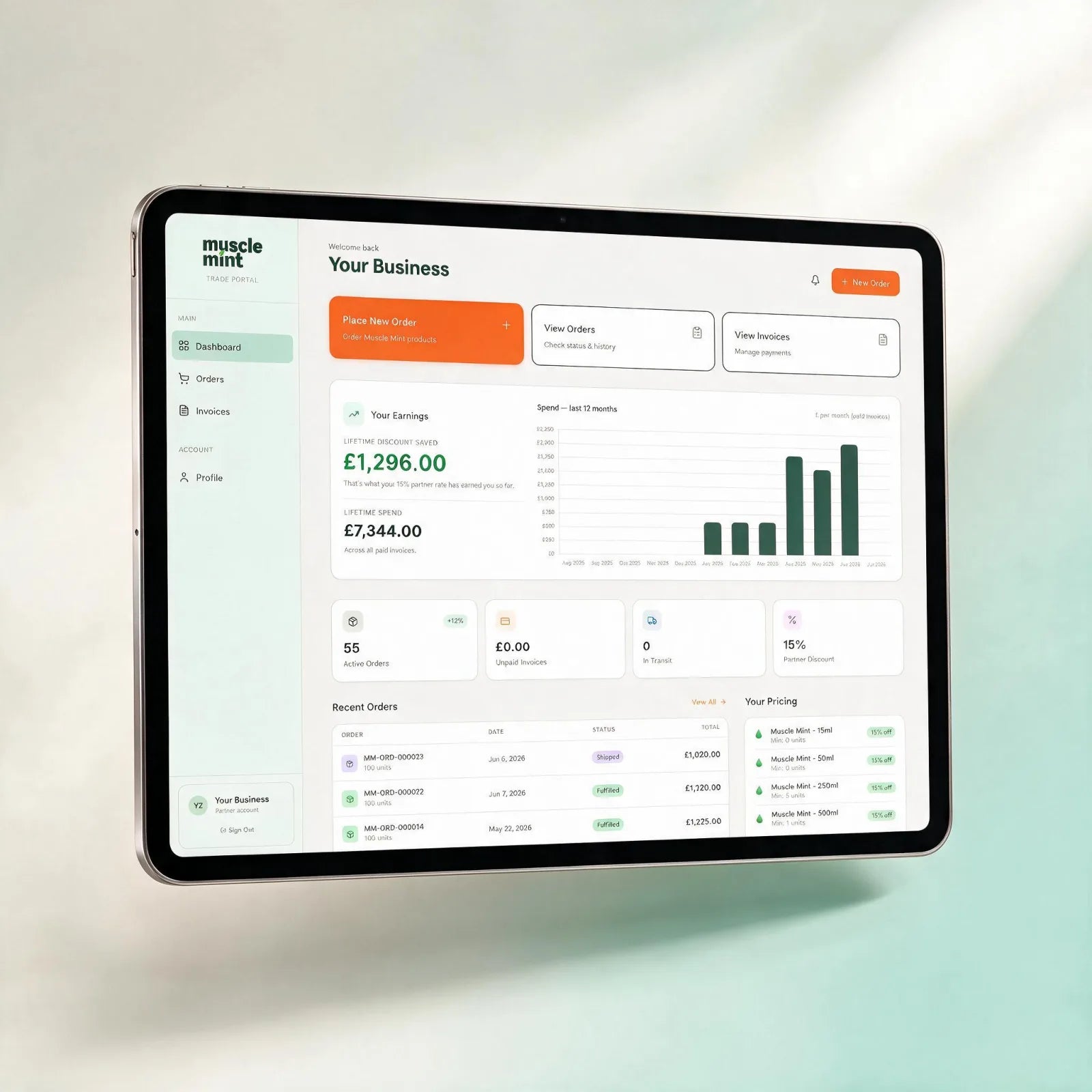 The Muscle Mint partner trade portal shown on a tablet, with orders, invoices and pricing in one dashboard